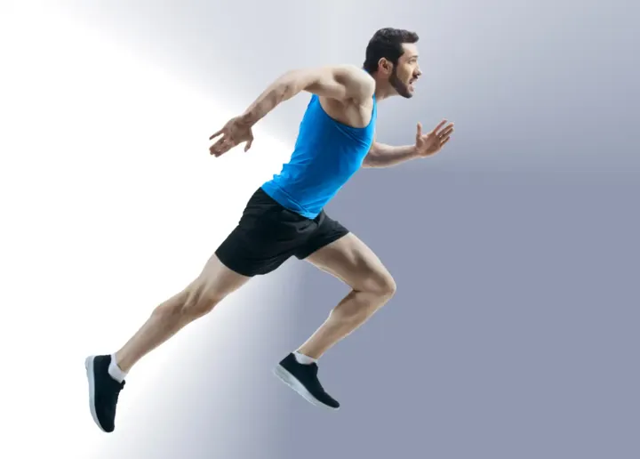 Man in blue shirt running