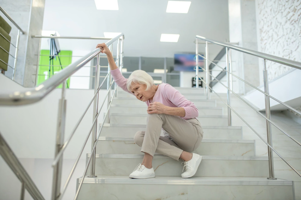 Knee Pain While Climbing Stairs? Causes, Treatment & Prevention